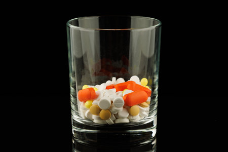 Lots of pills in a glassの写真素材