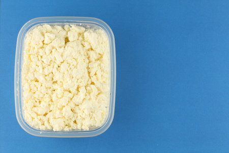 cottage cheese in a plastic containerの写真素材