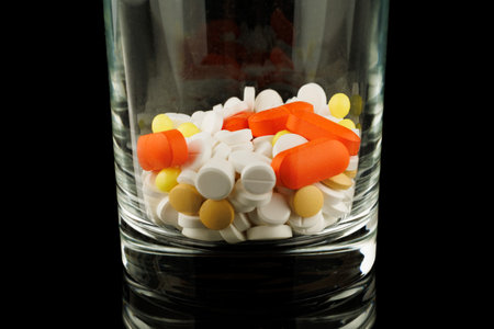Lots of pills in a glassの写真素材