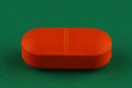 Orange oblong tablet. medical drugsの写真素材