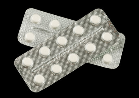 White pills in a transparent blisterの写真素材