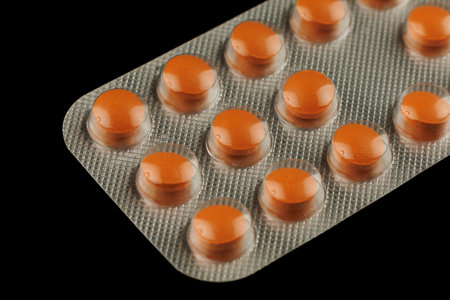 Orange pills in a transparent blisterの写真素材