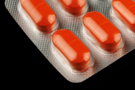 Orange pills in a transparent blisterの写真素材