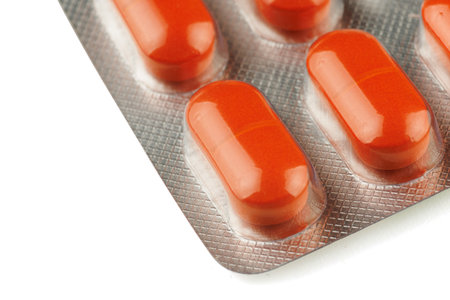 Orange pills in a transparent blisterの写真素材