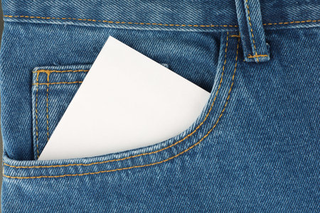 White waste paper sticker in pants pocketの写真素材