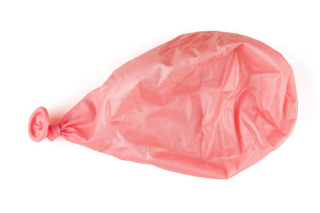 Pink inflated ball with wrinklesの写真素材