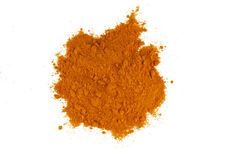 turmeric powder on a white isolate backgroundの写真素材