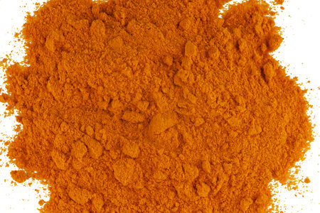 turmeric powder on a white isolate backgroundの写真素材