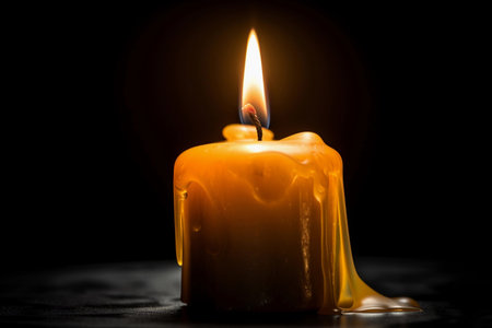 candle burns in the dark. AI Generatedの素材