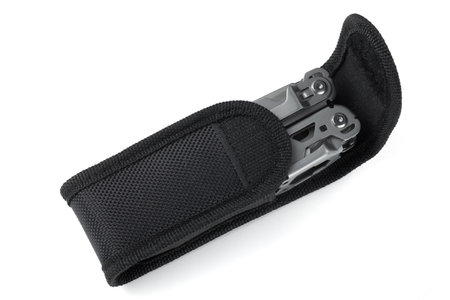 Multitool in a case on white