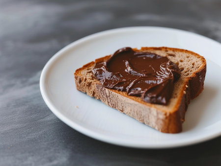 Rustic toast with chocolate, milk beside, gray backdropの素材