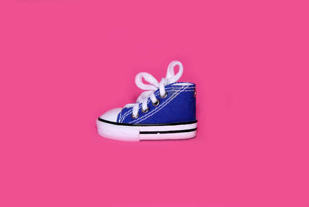 Sneakers on a bright pink backgroundの写真素材