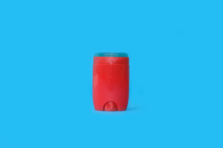 Male deodorant on a bright blue backgroundの写真素材