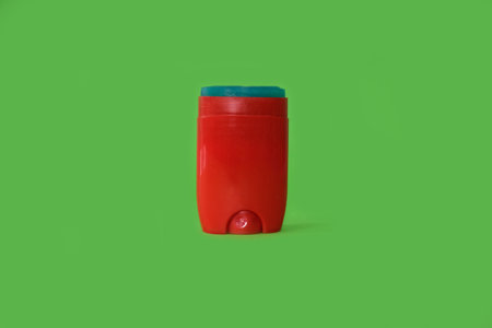 Male deodorant on a bright green backgroundの写真素材