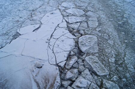 Ice cracks and floats on the river - the Northern Dvina. Arkhangelsk region, Russia.