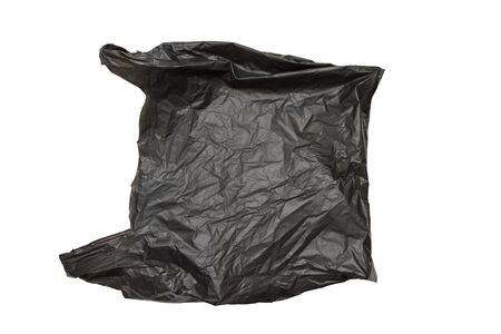 Black plastic bag isolated on whiteの写真素材