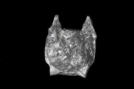 white plastic bag isolated on black.の写真素材