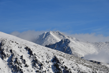 peak of snowy mountains in winter High Tatras Slovakiaの写真素材