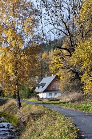 Cottage in a rural countryside in autumn or fall season  の写真素材