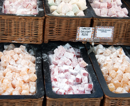 Turkish delight dessert candy sweets on display at market stall.