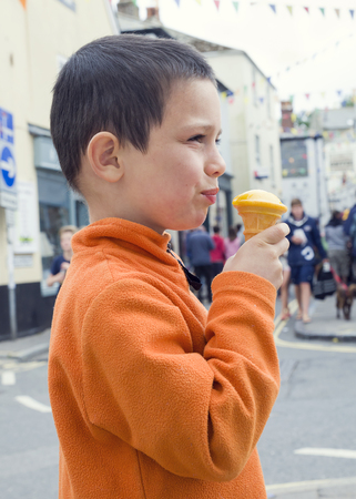 Child with ice creamの写真素材