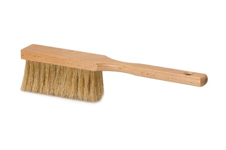 Bench brush with wooden handle isolated on white background. Dust brush or counter duster on white backgroundの写真素材