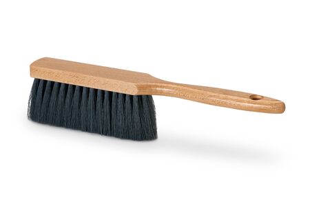 Bench brush with wooden handle isolated on white background. Dust brush or counter duster on white backgroundの写真素材