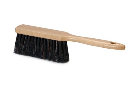 Bench brush with wooden handle isolated on white background. Dust brush or counter duster on white backgroundの写真素材