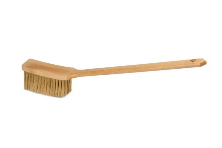Bench brush with wooden handle isolated on white background. Dust brush or counter duster on white backgroundの写真素材
