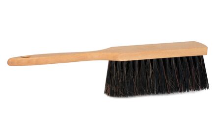 Bench brush with wooden handle isolated on white background. Dust brush or counter duster on white backgroundの写真素材