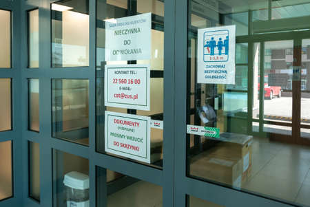 LUBLIN, POLAND - 8 April 2020: Closed entrance to Polish Social Insurance Institution (Polish:...
