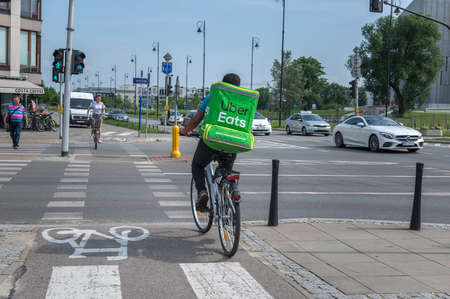WARSAW, POLNAD - June 15, 2019: UberEATS cycle delivery courier. Uber Eats delivery in progress on Warsaw street - Poland.
UberEATS is online food ordering and delivery serviceのeditorial素材