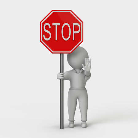 Guy holding a stop sign, which is red and has a metal tubeの写真素材