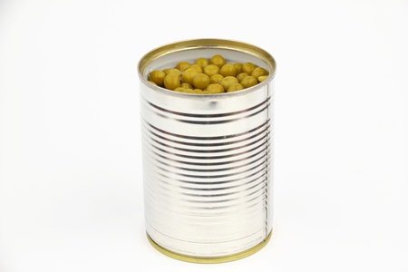 The tin with peas on the white backgroundの写真素材