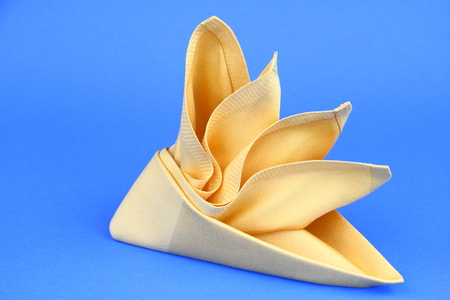 Folded napkin on the blue の写真素材