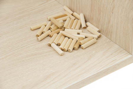 Chipboard with wooden pinの写真素材