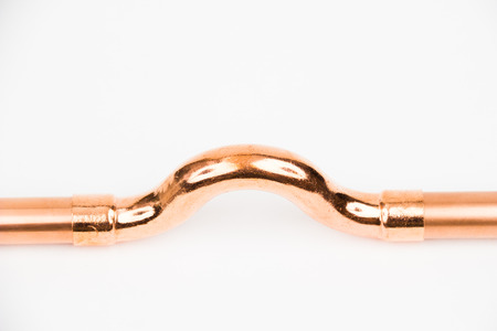 The part of copper installation on the white backgroundの写真素材