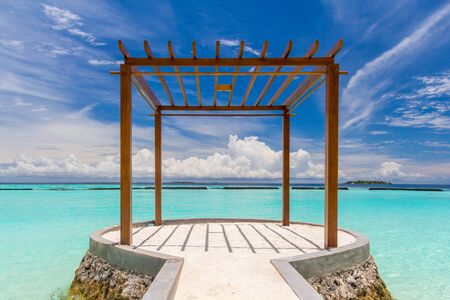 Wooden pavilion at Maldives in front of Indian oceanの写真素材