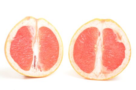 Fresh and healthy grapefruit isolated on whiteの写真素材