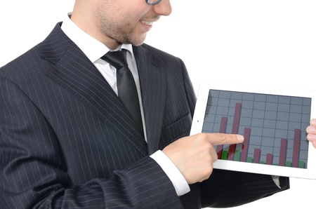 Young businessman with tablet isolated on whiteの写真素材