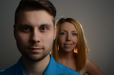 Portrait of young happy couple having funの写真素材