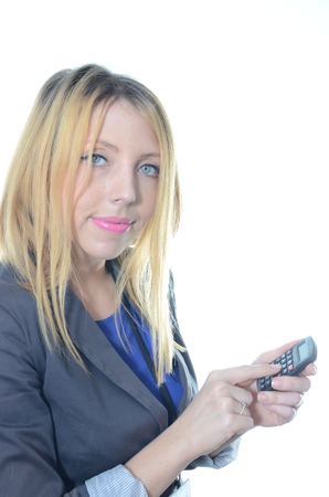 Young businesswoman with calculator isolatedの写真素材