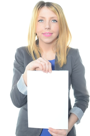 Young woman holding blank placard isolatedの写真素材