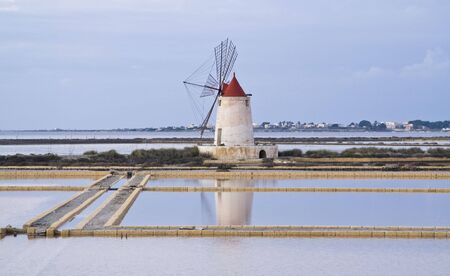 Typical windmill at the salt pond of Marsala, Sicily. Italy.の写真素材