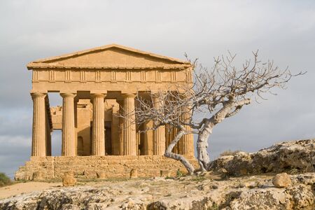 Ruins of Temple of Concord in Valley of the Temples in Agrigento (Akragas), Sicily. After Theseion in Athens, it is the best preserved Greek temple in the world.の写真素材