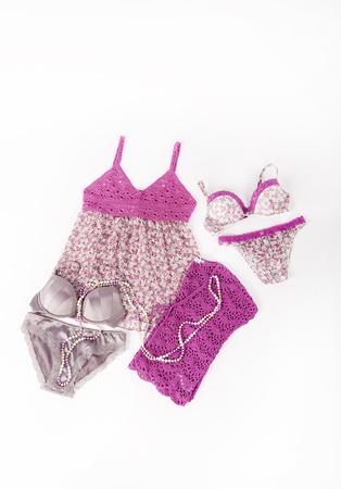 Sexy pink set of lingerie  bra, panties, nightdress  isolated on white backgroundの写真素材