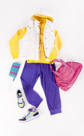 Set of sport cllothing for an active girl isolated on white background