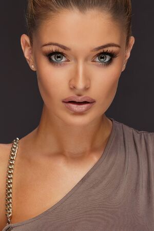 Portrait of beautiful young blonde ladyの写真素材