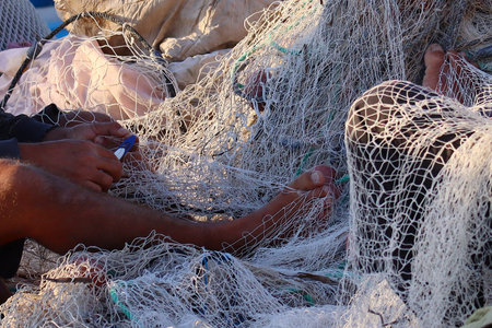 Fishing nets on a fishing boat in the port.の写真素材