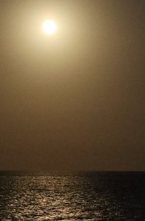 Beautiful sunset over the sea and the sun. Nature composition.の写真素材